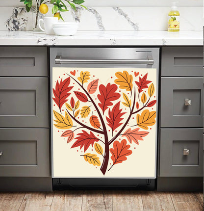 A dishwasher with a decorative dishwasher magnet autumn leaf tree design on the door, installed in a modern kitchen with dark blue cabinets and a white subway tile backsplash.